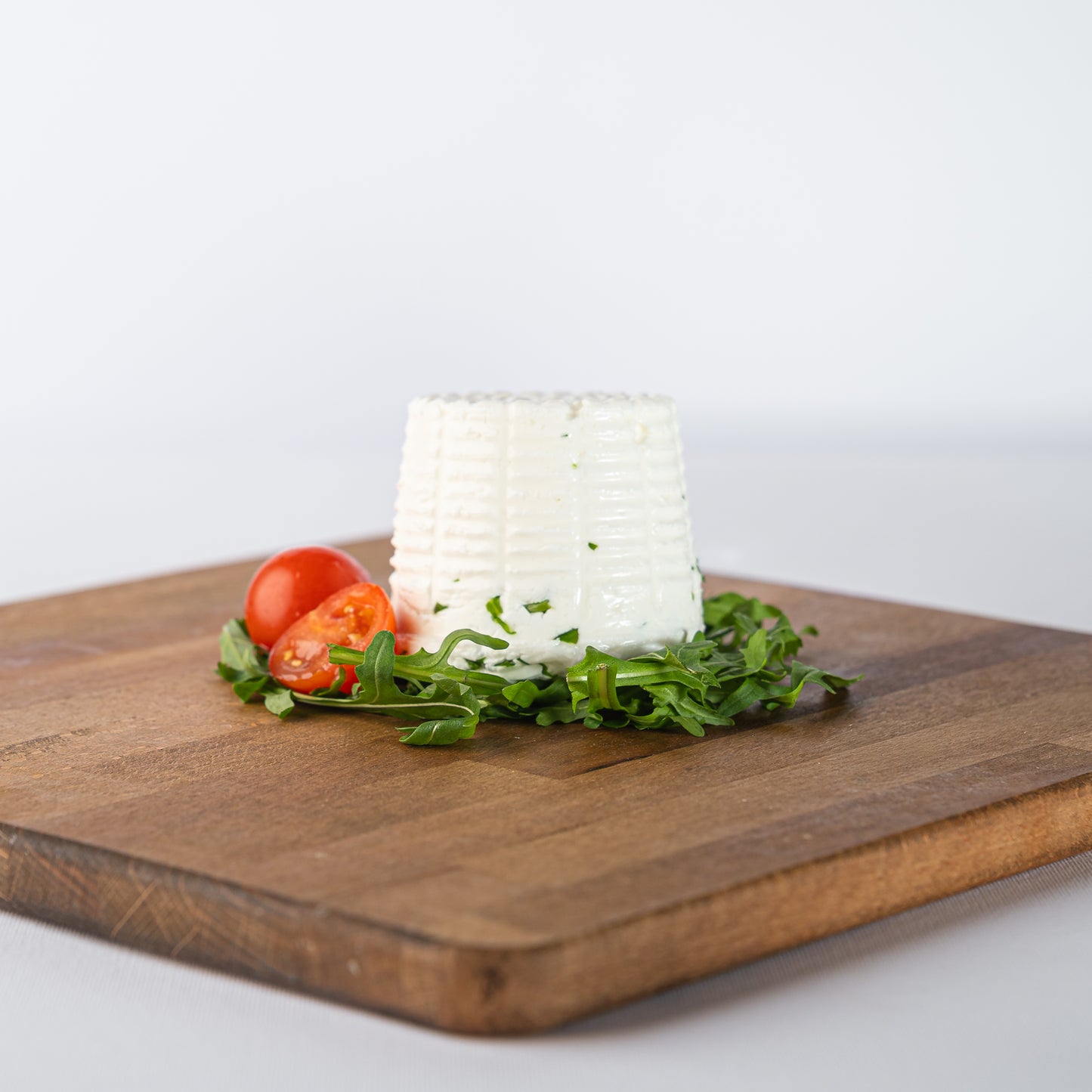 formaggio fresco con rucola