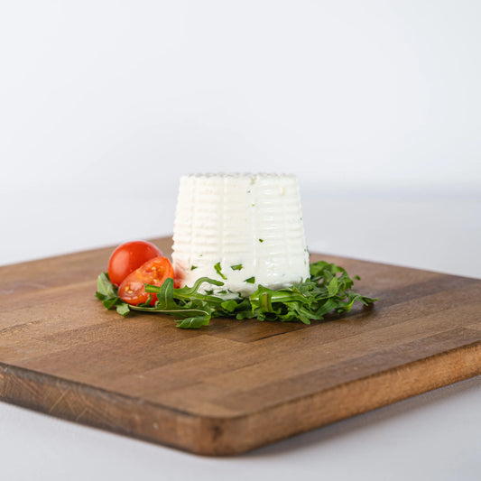 Formaggio fresco con rucola